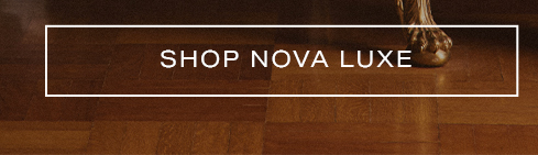 SHOP NOVA LUXE button on dark wood flooring with a glimpse of gilded furniture, promoting our new luxury collection.