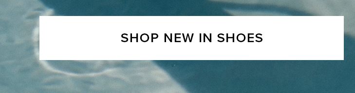 White call-to-action button, dark text "SHOP NEW IN SHOES" on a textured blue-green background. Explore the latest shoe collection.