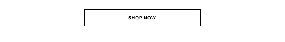 Blonde woman in a stylish pink and white Tweed Romance Mini Dress, featuring ornate buttons and a bustier top, holding a chic white clutch. Perfect for a fashionable look.