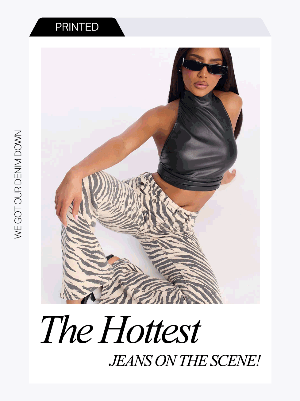 Model wearing black halter crop top and trendy beige zebra print flared jeans, promoting our hottest printed denim jeans.