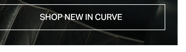 Black promotional banner with 'SHOP NEW IN CURVE' in white, over a dark quilted fabric texture, highlighting new plus-size clothing.