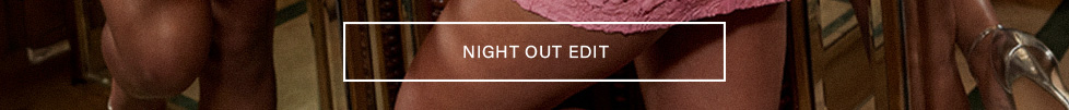 Close-up of a pink lace dress and silver heels, featuring the Night Out Edit text to promote a curated party wear fashion collection.