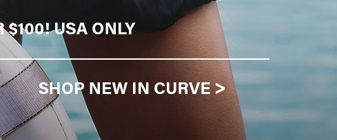 Dark-skinned person's leg and swimwear against a blurred blue background, inviting shoppers to explore new arrivals in the Curve collection.