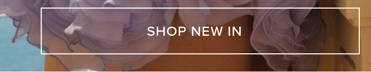 Flowing lavender clothing, draped against warm brown and cool blue tones. Discover and shop our new fashion arrivals now.