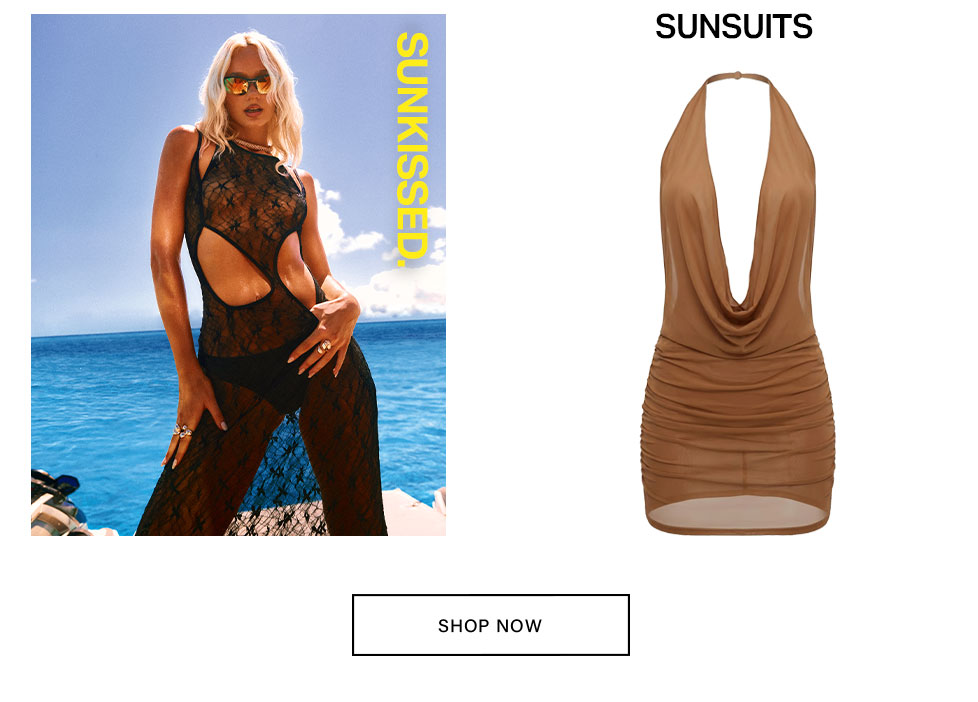 Blonde woman in black lace jumpsuit cover-up by blue ocean. Brown ruched halter sunsuit dress. Shop Sunkissed beachwear.
