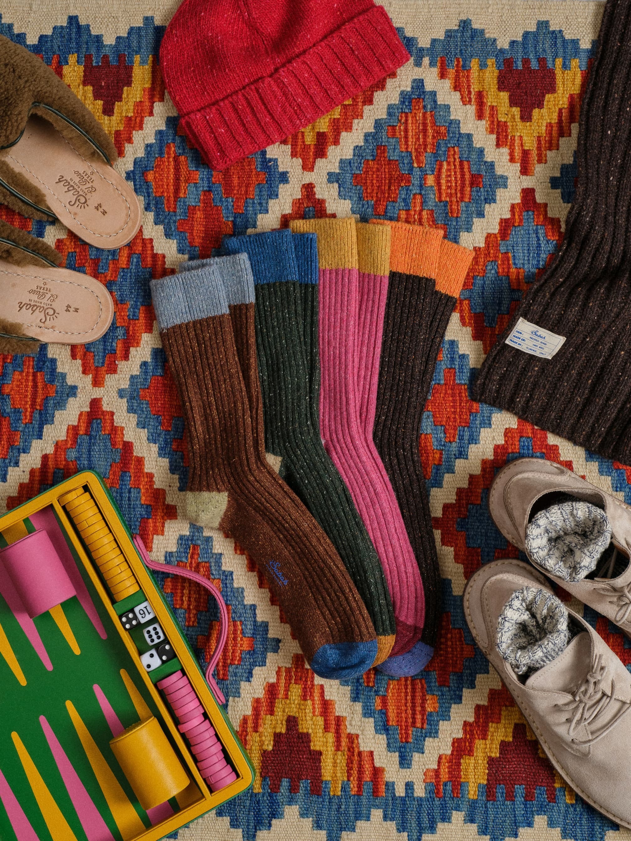 an image of a pair of feet in slippers on a rug
