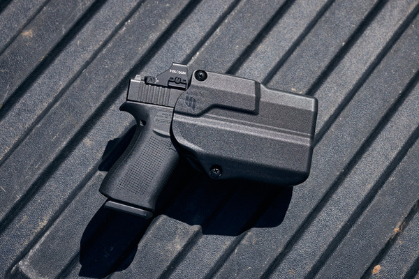 SOLIS with Glock 43x on tailgate