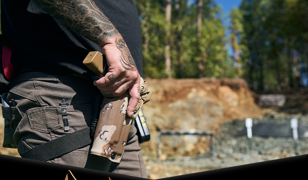 Chocolate Chip Camo Exclusive Holster on body at the range with Glock