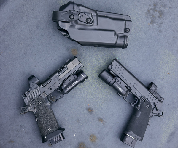 Staccato XC & Springfield with 6360RDS holster on a table