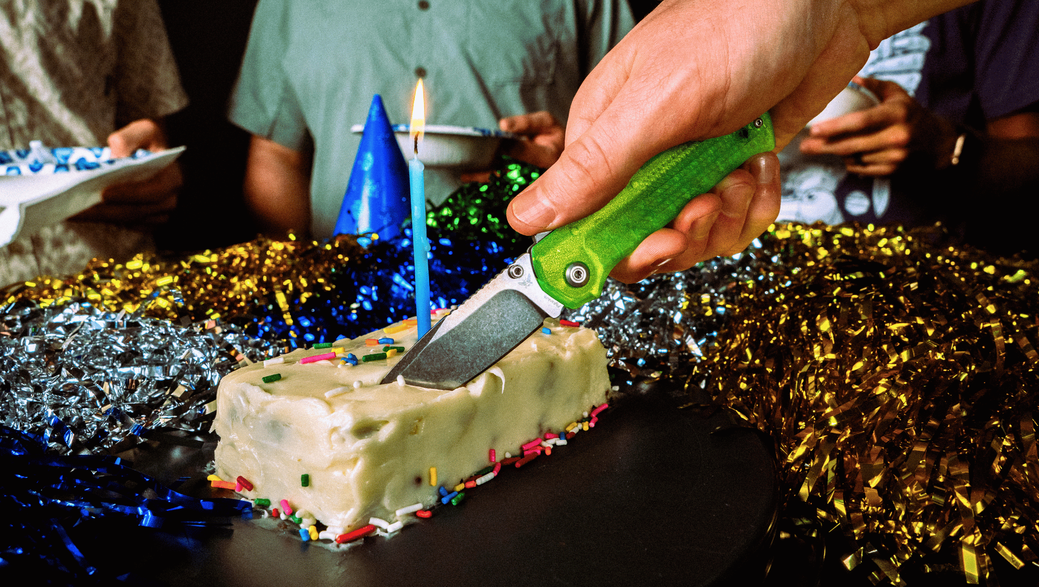 Flytanium Arcade knife cutting birthday cake.