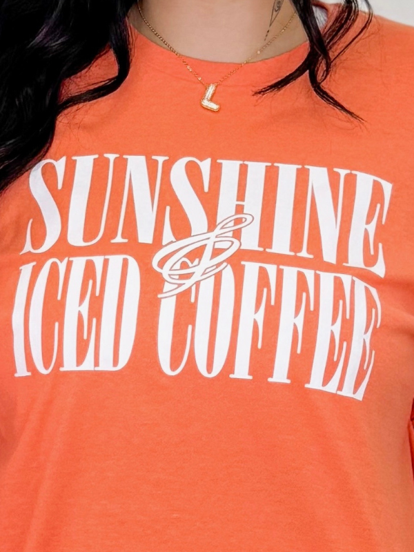 an image of a woman wearing a shirt that says sunshine and iced coffee