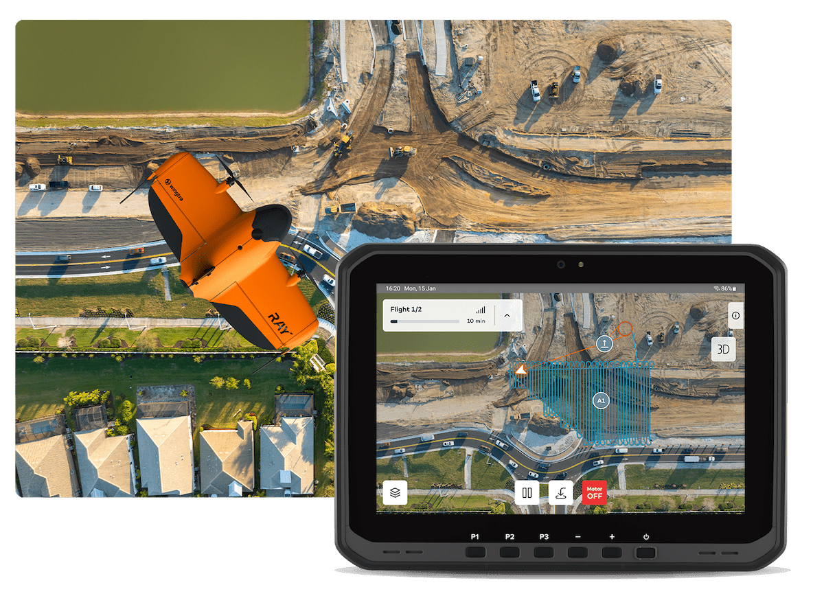 WingtraRay flying over a city