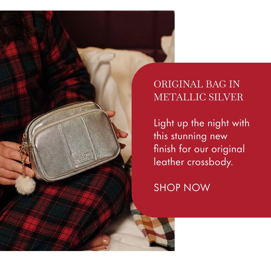 Original Bag in Metallic Silver  Light up the night with this stunning new finish for our original leather crossbody.  SHOP NOW