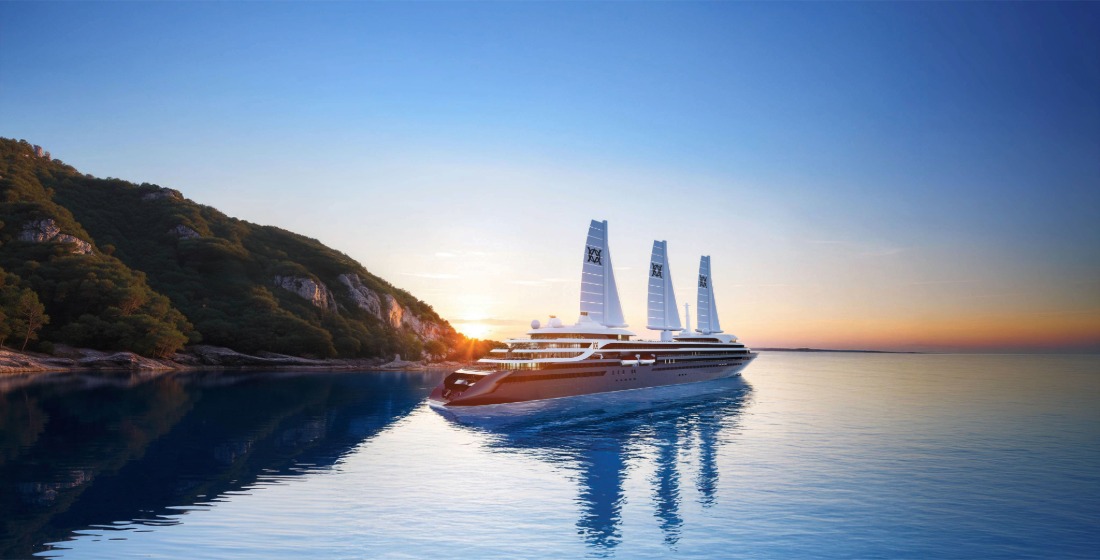 Atlas Ocean Voyages' ship Atlas Adventurer sailing near an island