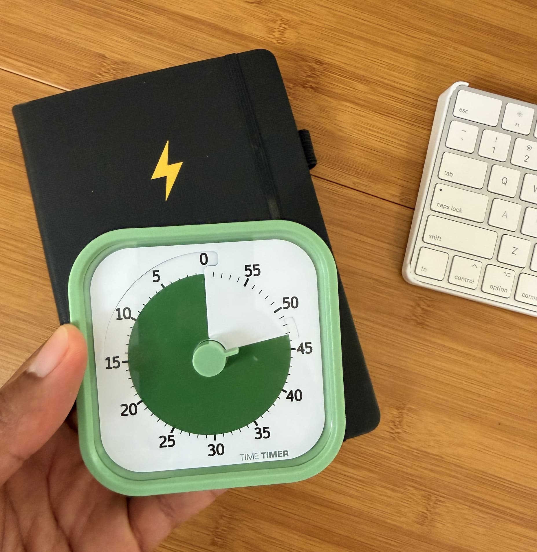 an image of a notebook with a list of tasks and a pen