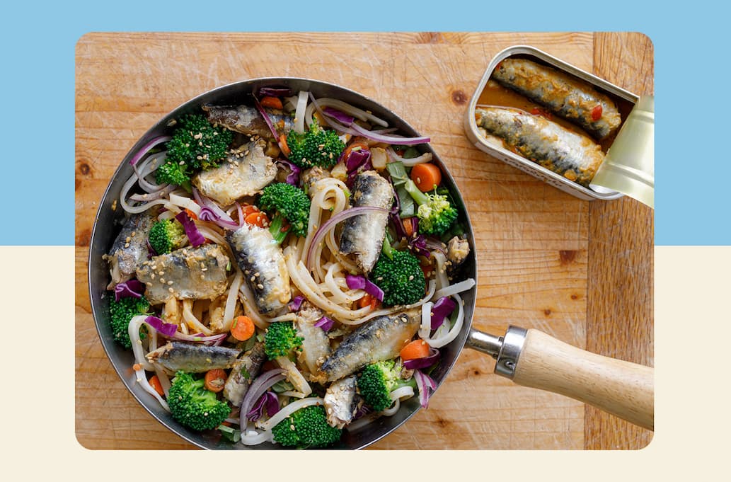 Sardines over noodles and vegetables