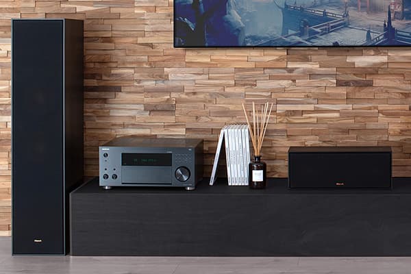 Onkyo TX-RZ50 against wood panel wall