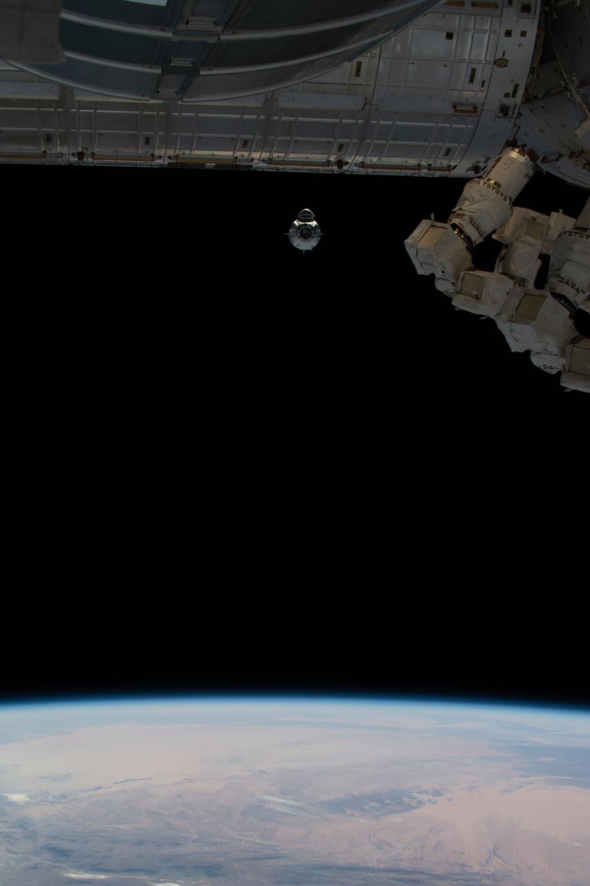 A Crew Dragon approaches the International Space Station