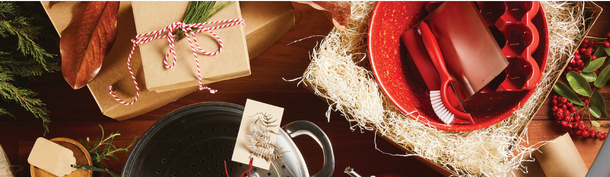 Image: Rachael Ray cookware and bakeware wrapped in Christmas packages and ribbons.