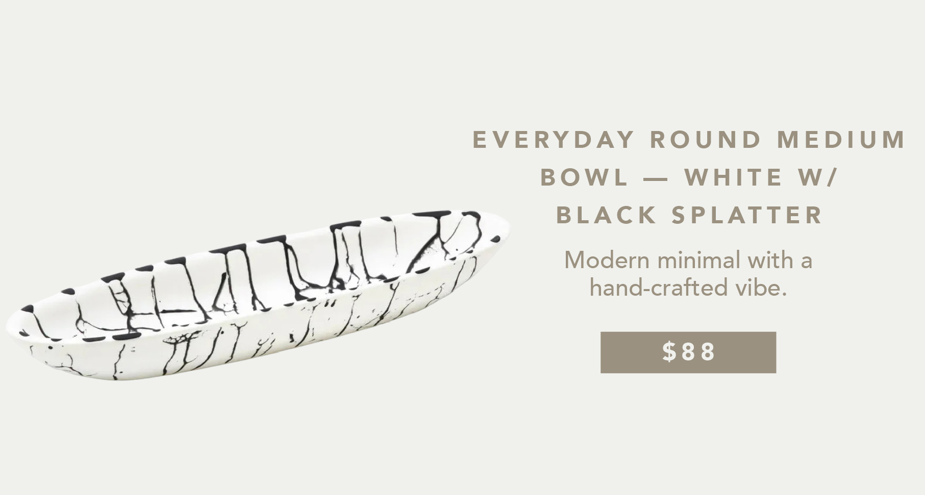 an image of a white and black spatula with a handcrafted knife