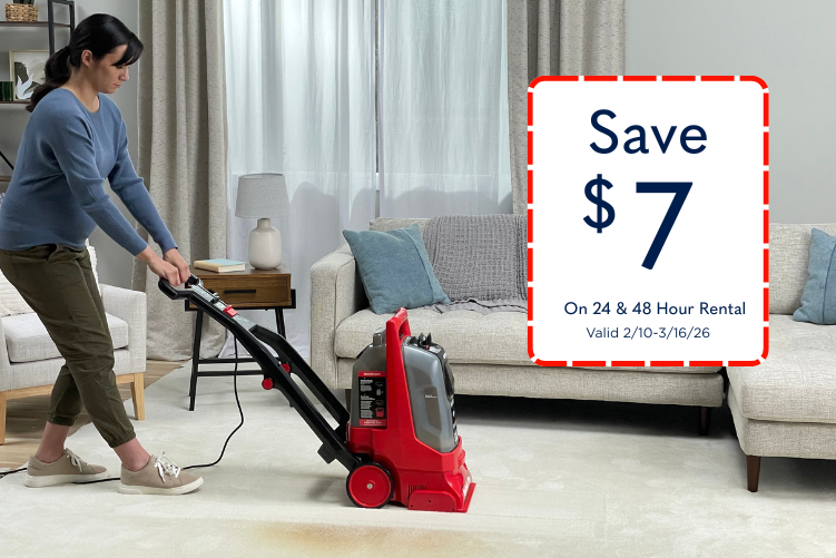 Woman cleaning carpet with Rug Doctor Pro Deep