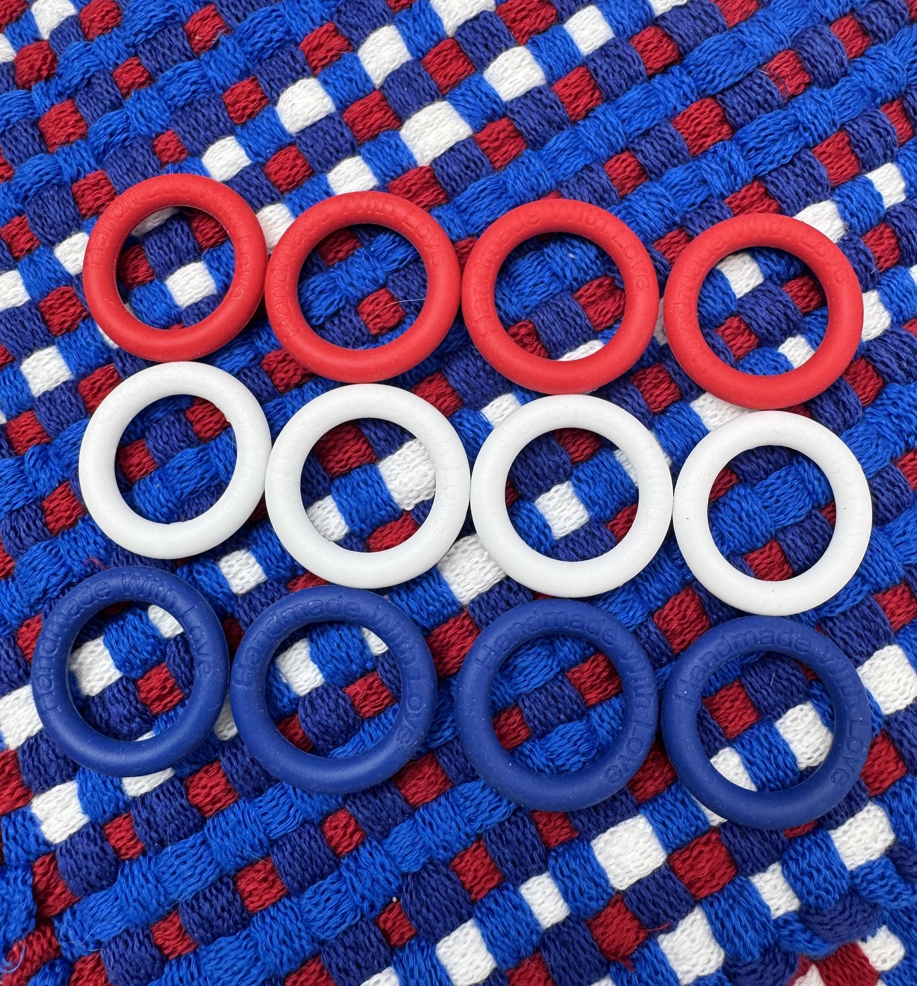 12 red, white, and blue silicone rings