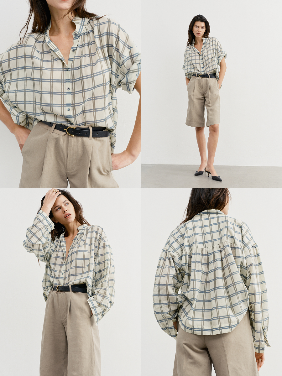 Face framing collar; airy, voluminous sleeves. Shop now.