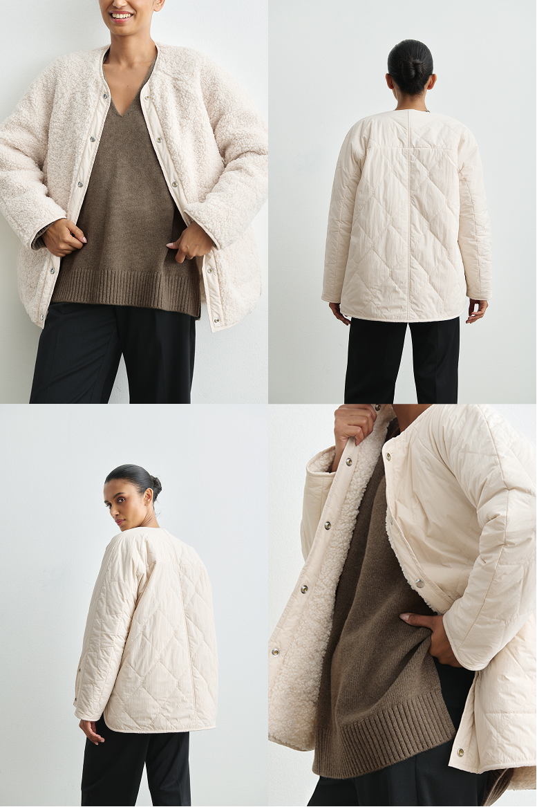 Snap closures, batted quilting, pockets on both sides.