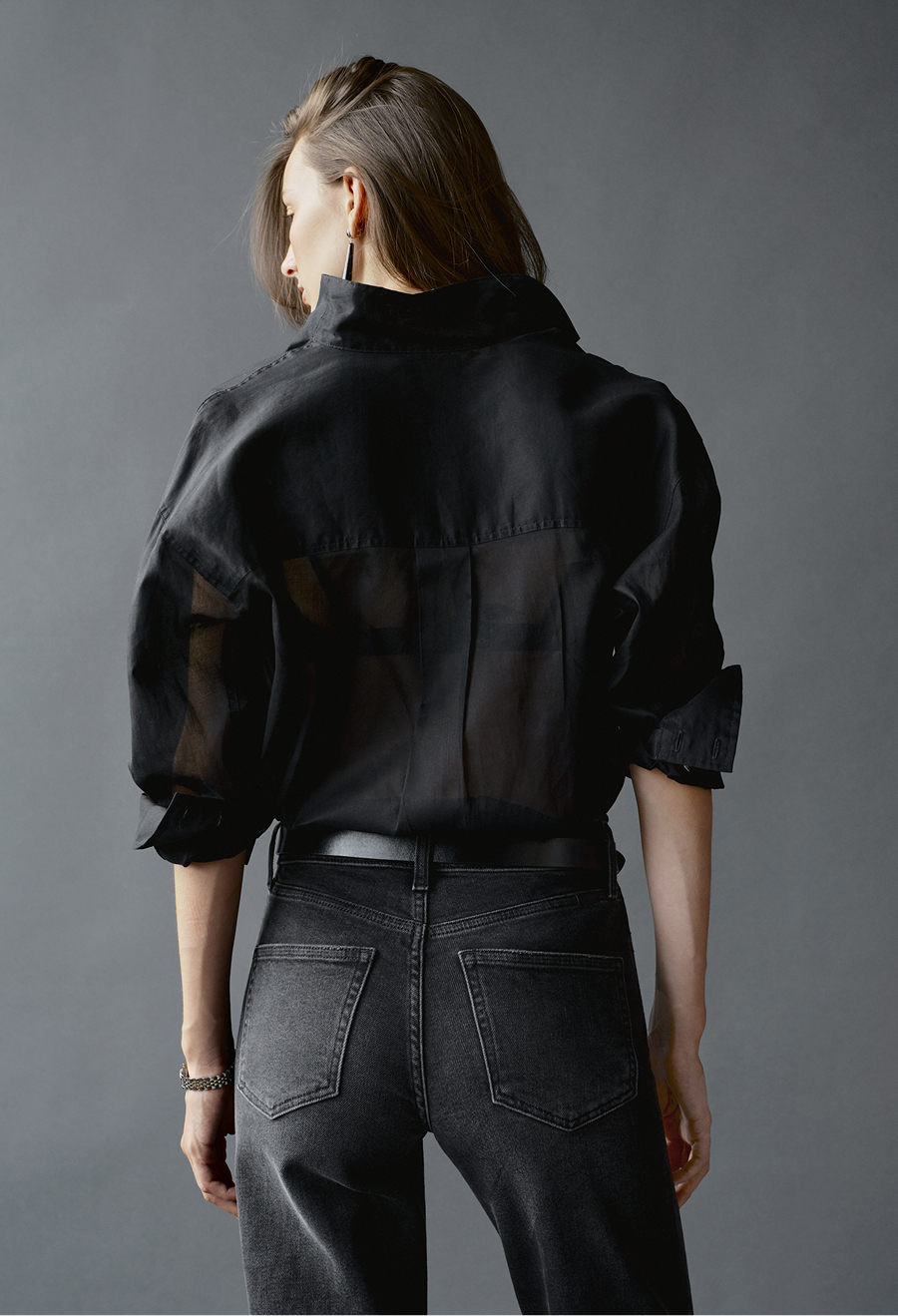An elegant, face-framing stand collar shirt.