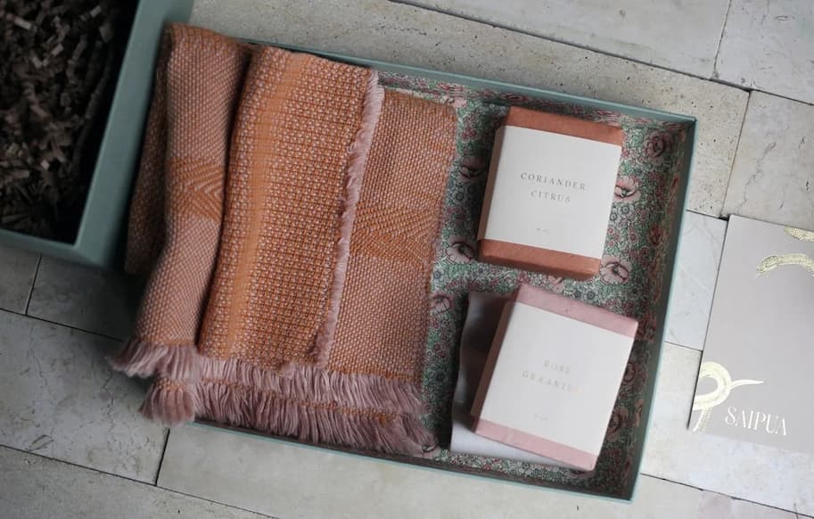 Handmade soap bars packaged in a decorative box