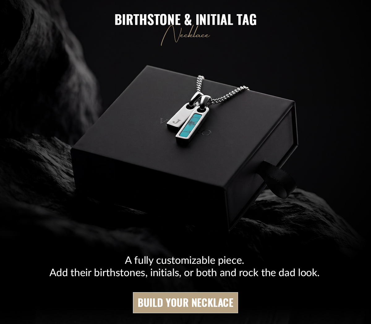 BIRTHSTONE & INITIAL TAG NECKLACE A fully customizable piece. Add their birthstones, initials, or both and rock the dad look. 