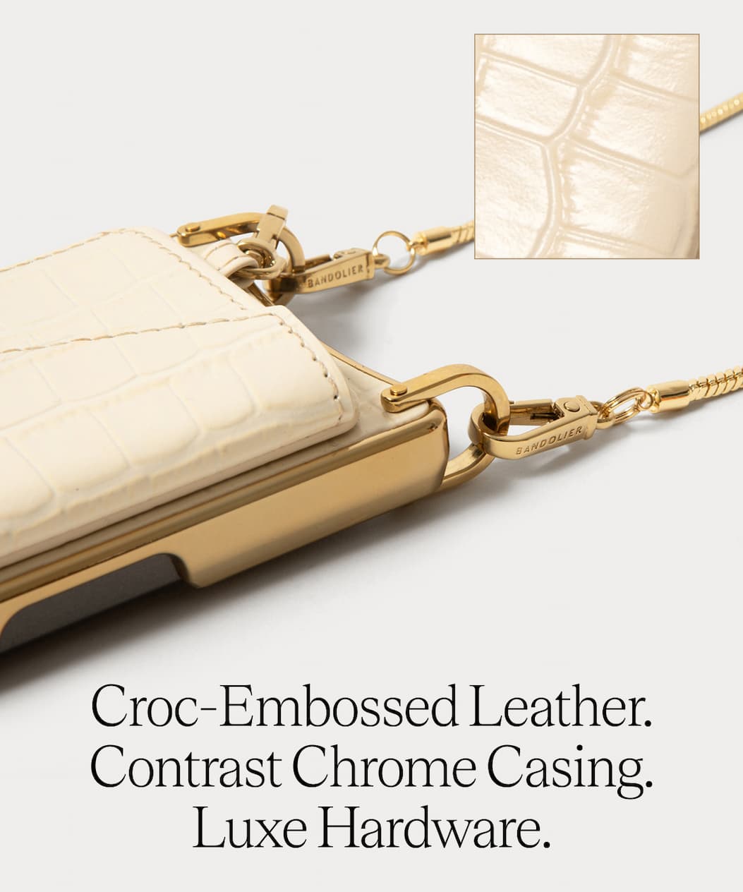 Croc-Embossedd Leathere. Contrast Chrome Casing. Luxe Hardwawre
