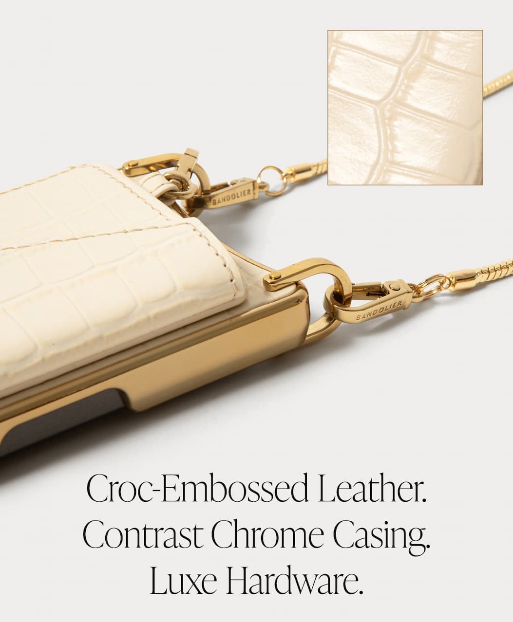 Croc-Embossed Leather. Contrast Chrome Casing Luxe Hardware.