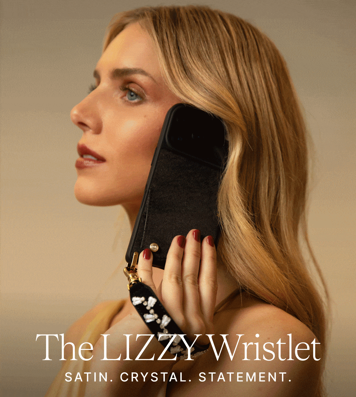The LIZZY Wristlet SATIN. CRYSTAL. STATEMENT.