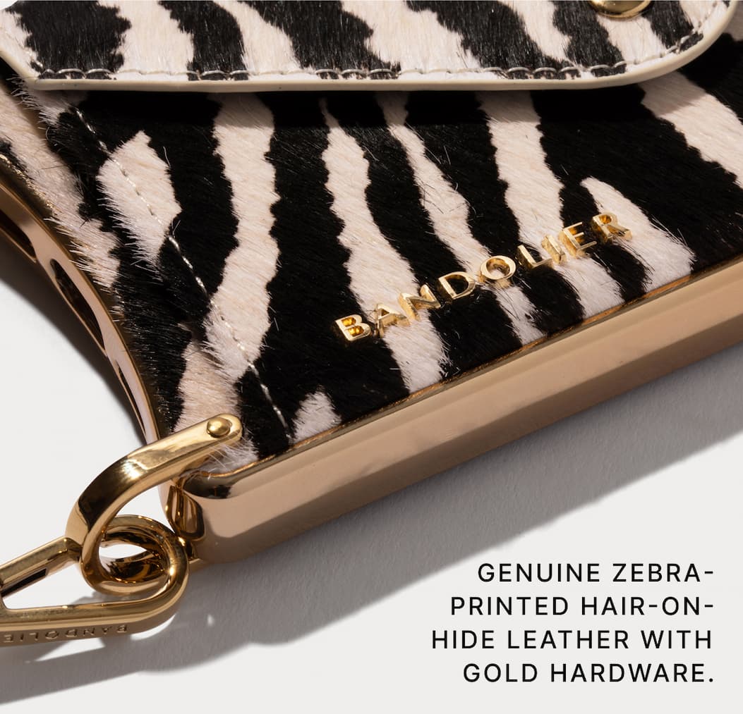 GENUINE ZEBRA - PRINTED HAIR-ON-HIDE LEATHER WITH GOLD HARDWARE.