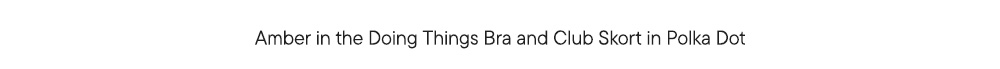 Amber in the Doing Things Bra and Club Skort in Polka Dot