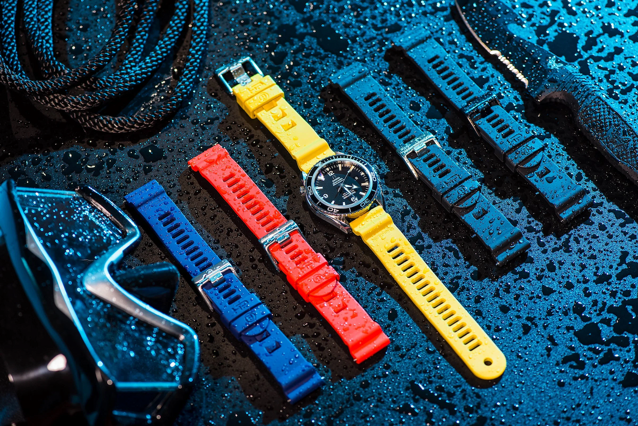 an image of a watch and other items on a table