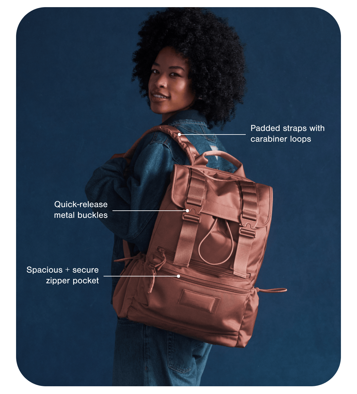 Padded straps with carabiner loops. Quick-release metal buckles. Spacious + secure zipper pocket.