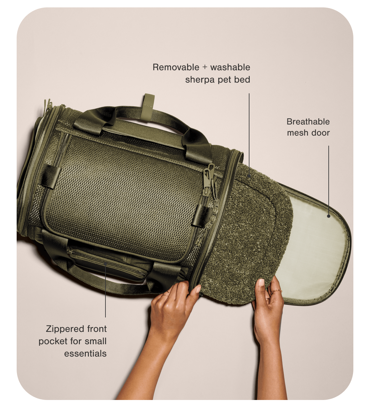 Removable + washable sherpa pet bed. Breathable mesh door. Zippered front pocket for small essentials.