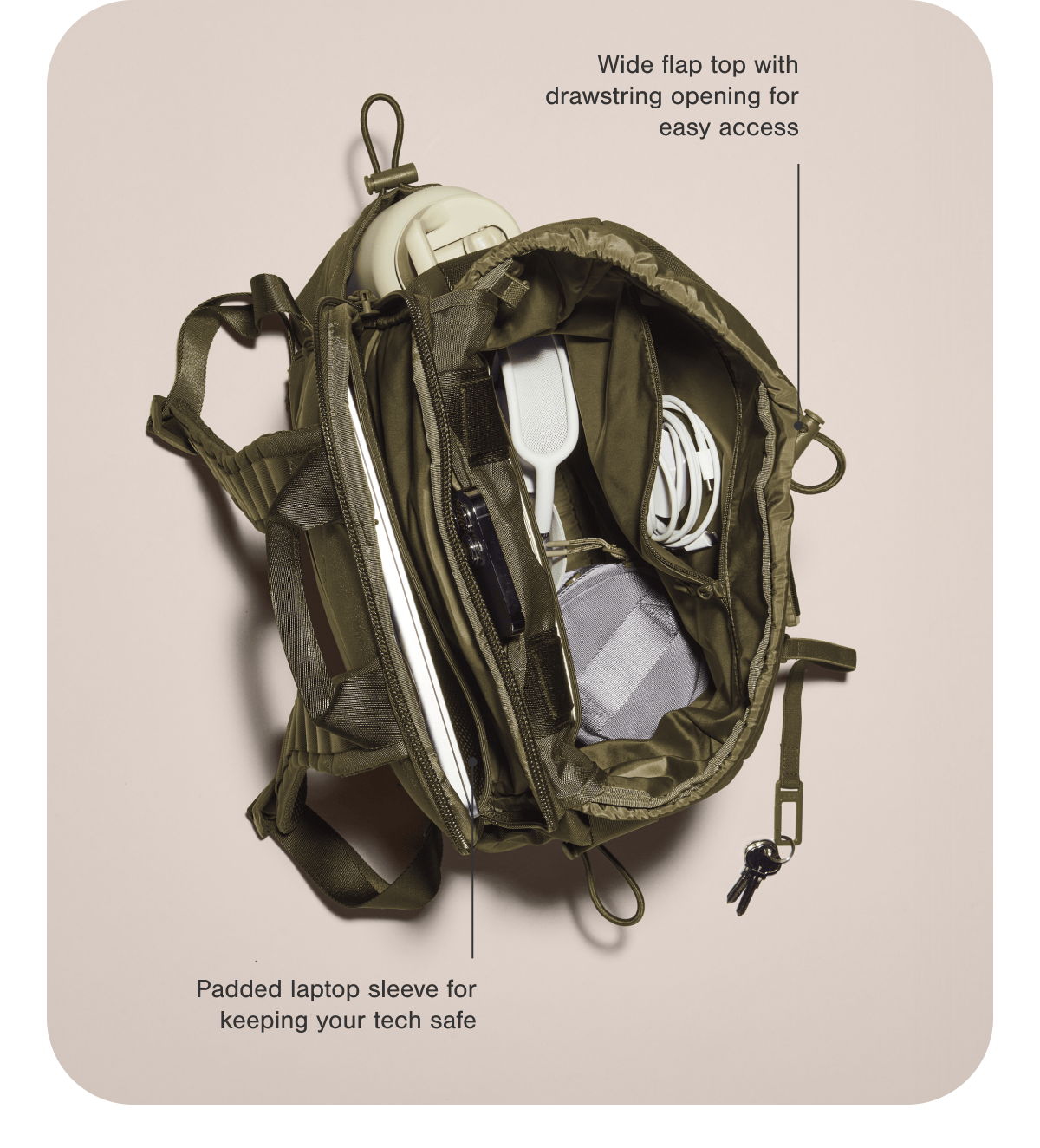 Wide flap top with drawstring opening for easy access. Padded laptop sleeve for keeping your tech safe.