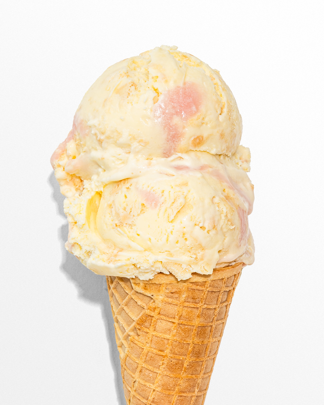 a cone of Frosted Sugar Cookie ice cream