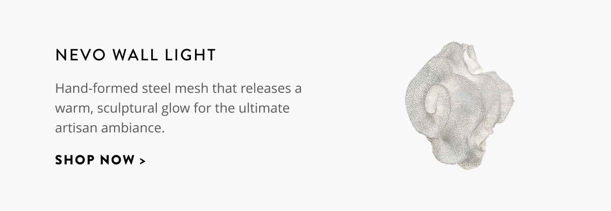 Nevo Wall Light: Hand-formed steel mesh that releases a warm, sculptural glow for the ultimate artisan ambiance. Shop now.