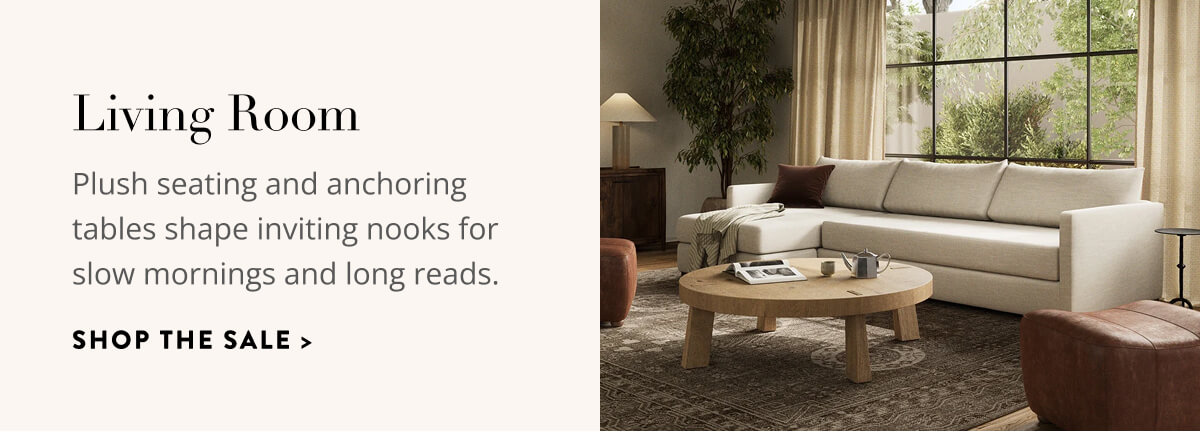 Living Room: Plush seating and anchoring tables shape inviting nooks for slow mornings and long reads. Shop the Sale.