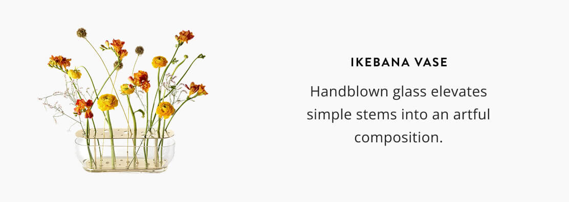 Ikebana Vase: Handblown glass elevates simple stems into an artful composition.