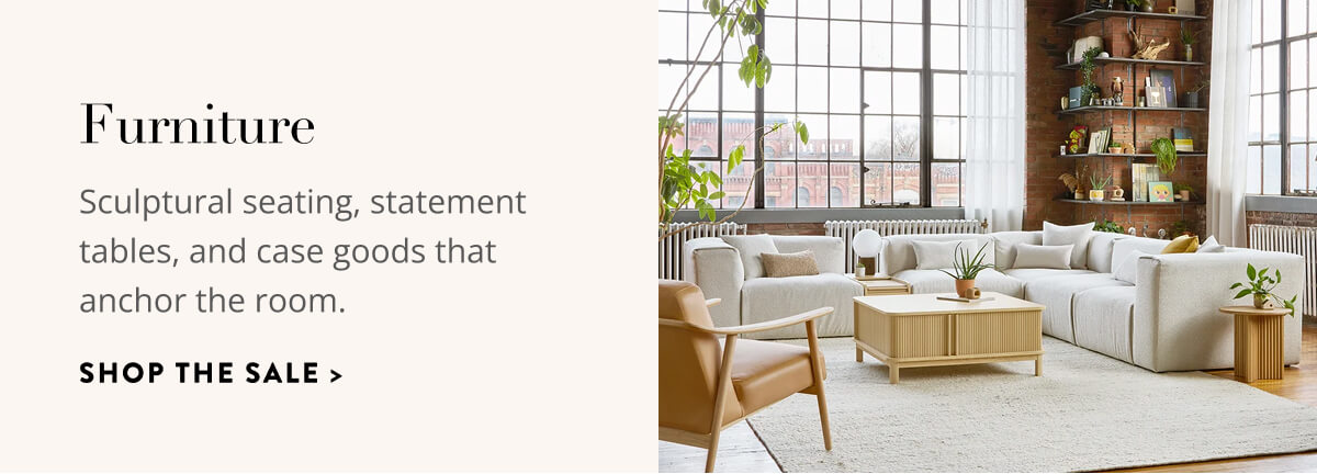 Furniture: Sculptural seating, statement tables, and case goods that anchor the room. Shop the sale.