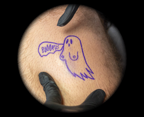 Gif of ghost with boobs tat and print