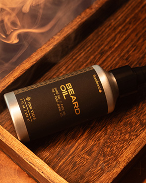 A bottle of four vices beard oil