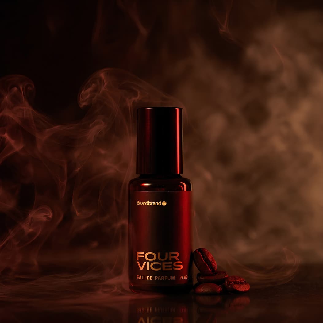 a bottle of Four Vices cologne on a smokey black and brown backdrop with red neon lighting and a few coffee beans next to the bottle. 