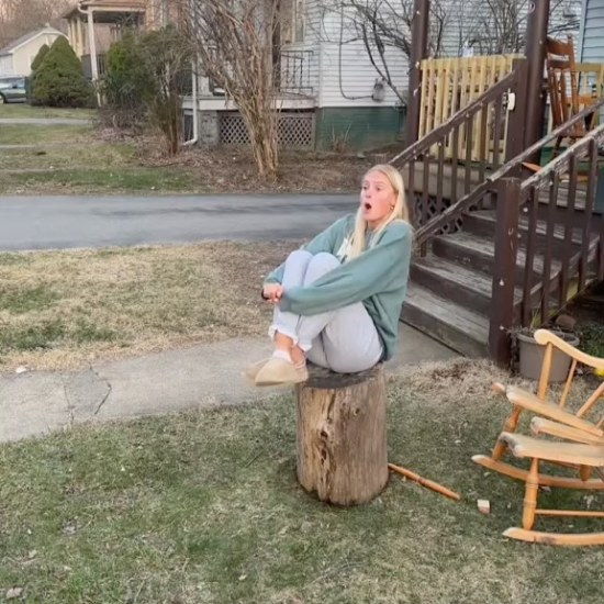 Moobie sitting on a stump