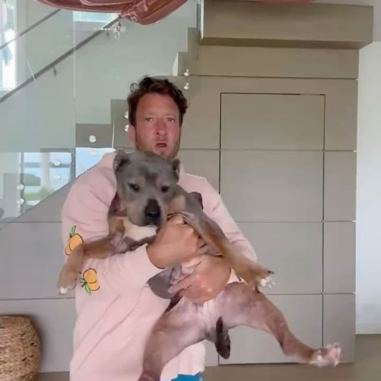 Dave Portnoy posing with Miss Peaches